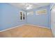 Light and airy bedroom with carpet flooring and two windows at 255 W End Dr # 2201, Punta Gorda, FL 33950