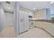 Kitchen with white cabinets, granite countertops, and stainless steel appliances at 255 W End Dr # 2201, Punta Gorda, FL 33950