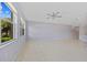 Living room with tile floors and large windows at 255 W End Dr # 2201, Punta Gorda, FL 33950