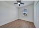 Spacious bedroom with wood-look floors and a large closet at 16 Tee View Rd, Rotonda West, FL 33947