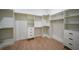 Large walk-in closet with ample shelving and hanging space at 16 Tee View Rd, Rotonda West, FL 33947