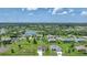 Aerial view of houses and landscape at 16 Tee View Rd, Rotonda West, FL 33947