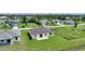 Aerial view of house and neighborhood at 16 Tee View Rd, Rotonda West, FL 33947