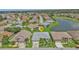 Aerial view of the property, showcasing its location in a quiet neighborhood at 24703 Buckingham Way, Punta Gorda, FL 33980