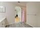 Bathroom with a shower and view into a bedroom at 4171 Magenta Ave, North Port, FL 34288