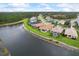 Aerial view of lakefront homes in a tranquil community at 1751 Scarlett Ave, North Port, FL 34289