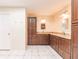 Bathroom with double sinks, granite countertop and ample storage at 2216 Pellam Blvd, Port Charlotte, FL 33948