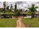 Scenic waterfront property with a private dock and walkway at 2216 Pellam Blvd, Port Charlotte, FL 33948