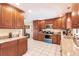 Spacious kitchen boasting granite countertops and ample cabinetry at 2216 Pellam Blvd, Port Charlotte, FL 33948