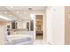 Bathroom featuring a large bathtub and skylight at 2216 Pellam Blvd, Port Charlotte, FL 33948