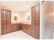 Double vanity bathroom with a large shower and storage at 2216 Pellam Blvd, Port Charlotte, FL 33948