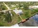 Waterfront home with private dock and lush landscaping at 2216 Pellam Blvd, Port Charlotte, FL 33948