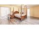 Spacious bedroom with wood flooring and a large bed at 2216 Pellam Blvd, Port Charlotte, FL 33948