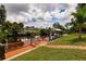 Private dock with seating area overlooking a tranquil canal at 2216 Pellam Blvd, Port Charlotte, FL 33948
