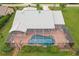 Home with a screened-in pool and spacious backyard at 2216 Pellam Blvd, Port Charlotte, FL 33948