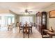 Formal dining room with a wooden table and china cabinet at 2216 Pellam Blvd, Port Charlotte, FL 33948