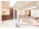 Large bathroom with a walk-in shower and double vanity at 2216 Pellam Blvd, Port Charlotte, FL 33948