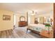 Main bedroom with a post bed, mirrored closet, and wood flooring at 2216 Pellam Blvd, Port Charlotte, FL 33948