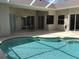 Relaxing pool area with patio and access to house at 1292 W Hillsborough Blvd, North Port, FL 34288