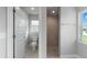 Bathroom with toilet, shower, and updated vanity at 9461 Attica Cir, Port Charlotte, FL 33981