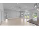 Bright living room with high ceilings and neutral color palette at 9461 Attica Cir, Port Charlotte, FL 33981