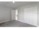 Spacious bedroom with ample closet space and neutral carpeting at 9461 Attica Cir, Port Charlotte, FL 33981