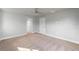 Spacious bedroom with neutral walls and carpet at 9461 Attica Cir, Port Charlotte, FL 33981