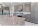 Spacious kitchen featuring stainless steel appliances and granite countertops at 9461 Attica Cir, Port Charlotte, FL 33981