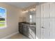 Bathroom with double vanity and granite countertop at 9461 Attica Cir, Port Charlotte, FL 33981