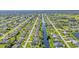 Property view showcasing canal-front location in a residential neighborhood at 286 Mark Twain Ln, Rotonda West, FL 33947