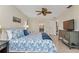 King bedroom with access to bathroom and additional dresser at 286 Mark Twain Ln, Rotonda West, FL 33947