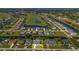 Bird's eye view of the property and surrounding golf course community at 286 Mark Twain Ln, Rotonda West, FL 33947