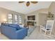 Spacious living room with vaulted ceiling and comfy seating at 286 Mark Twain Ln, Rotonda West, FL 33947