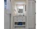 Guest bathroom with vanity and linen closet at 286 Mark Twain Ln, Rotonda West, FL 33947