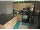 Updated kitchen with granite countertops and stainless steel appliances at 26485 Rampart Blvd # D6, Punta Gorda, FL 33983