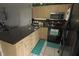 Updated kitchen with granite countertops and stainless steel appliances at 26485 Rampart Blvd # D6, Punta Gorda, FL 33983