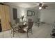 Condo dining area with table and chairs near kitchen at 26485 Rampart Blvd # D6, Punta Gorda, FL 33983