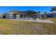 Relaxing pool area with lounge chairs and a screened enclosure at 26485 Rampart Blvd # D6, Punta Gorda, FL 33983