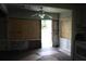 This kitchen features a door to the outside and needs complete renovation at 702 W Olympia Ave, Punta Gorda, FL 33950