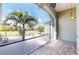 Relaxing screened porch overlooking backyard and neighborhood at 23098 Ambassador Ave, Port Charlotte, FL 33954