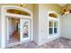 Front entry with double doors and sidelights at 23098 Ambassador Ave, Port Charlotte, FL 33954