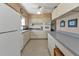 Full view of kitchen with ample counter space and storage at 22557 Bolanos Ct, Port Charlotte, FL 33952