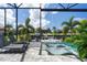 Private pool and spa with lounge chairs and waterfront views at 2511 Rio Largo Ct, Punta Gorda, FL 33950