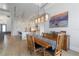 Bright dining room features a large wooden table with seating for six and hardwood floors at 2511 Rio Largo Ct, Punta Gorda, FL 33950