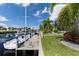 Private boat dock with sailboat and lush landscaping at 2511 Rio Largo Ct, Punta Gorda, FL 33950