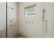 Large walk-in shower with pebble floor and built-in bench at 2511 Rio Largo Ct, Punta Gorda, FL 33950