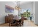 Elegant dining room featuring hardwood floors and a large window at 2511 Rio Largo Ct, Punta Gorda, FL 33950