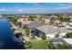 Aerial view of waterfront property with private dock and pool at 2511 Rio Largo Ct, Punta Gorda, FL 33950