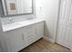 Bright bathroom with double sink vanity, drawers and modern fixtures at 2000 Bal Harbor Blvd # 1012, Punta Gorda, FL 33950