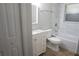 Bathroom featuring a vanity, toilet, and shower/tub combination with tile surround at 2000 Bal Harbor Blvd # 1012, Punta Gorda, FL 33950